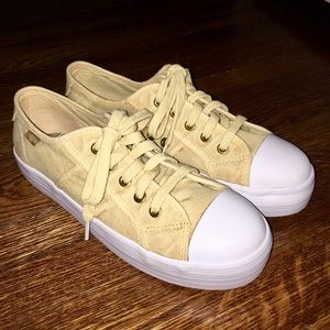 Pale yellow rocket dog platform ish sneakers